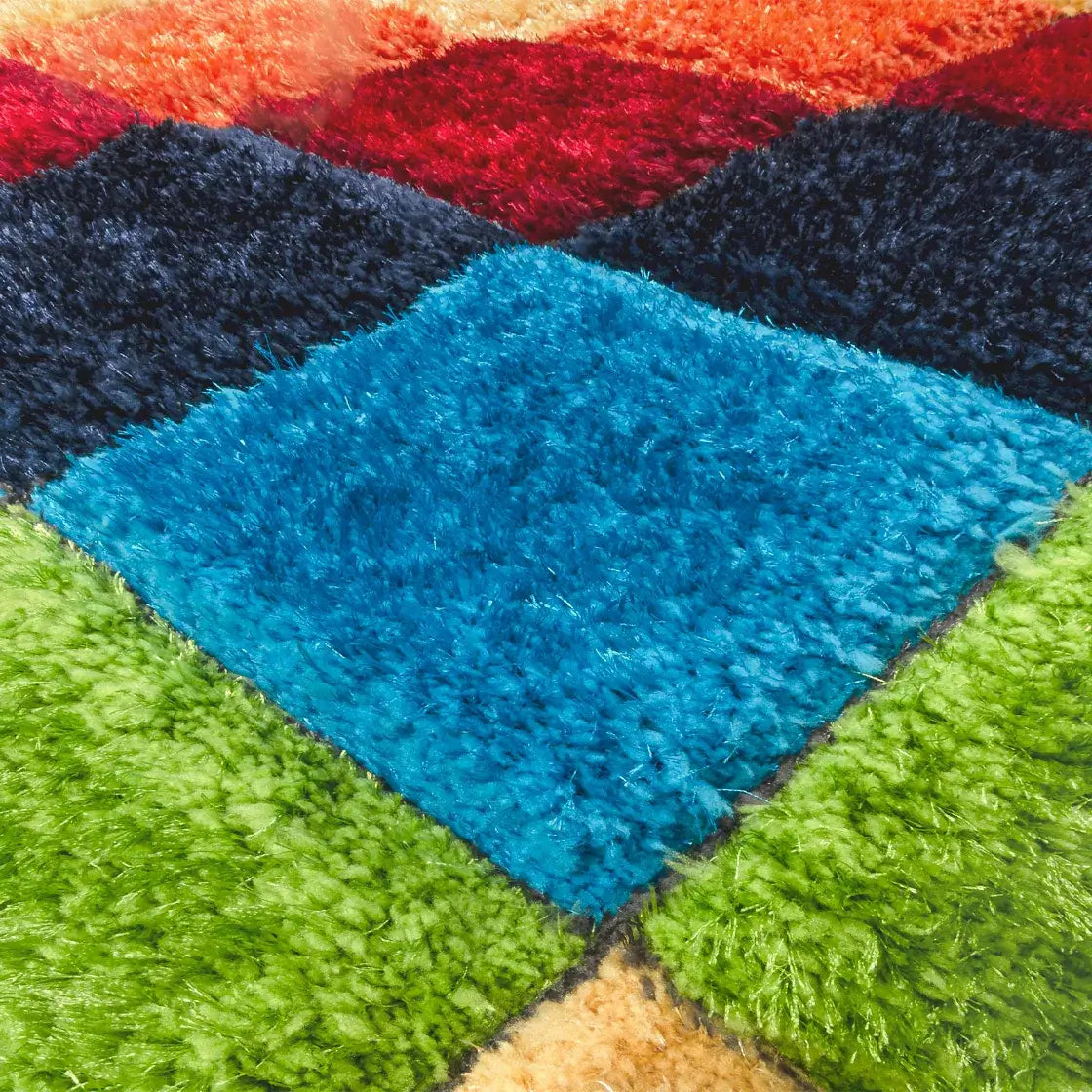 Colorful Kidora decorative rug featuring vibrant squares of blue, green, red, and black for kids' rooms.